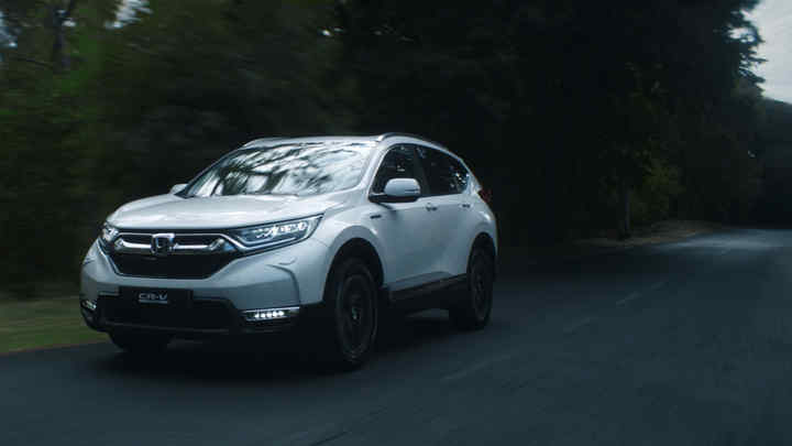 Zijaanzicht van de Honda CR-V Hybrid.