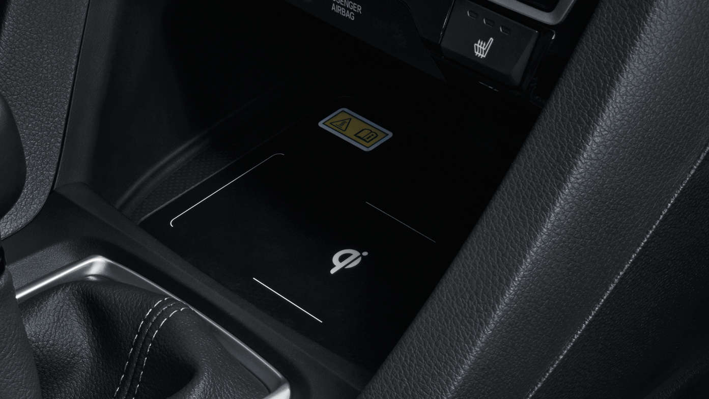 Interieurfoto Honda Civic 5-deurs met draadloze oplader.