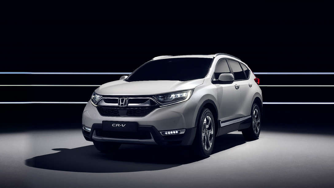Voor/zijaanzicht geavanceerde hybride aandrijving Honda CR-V.