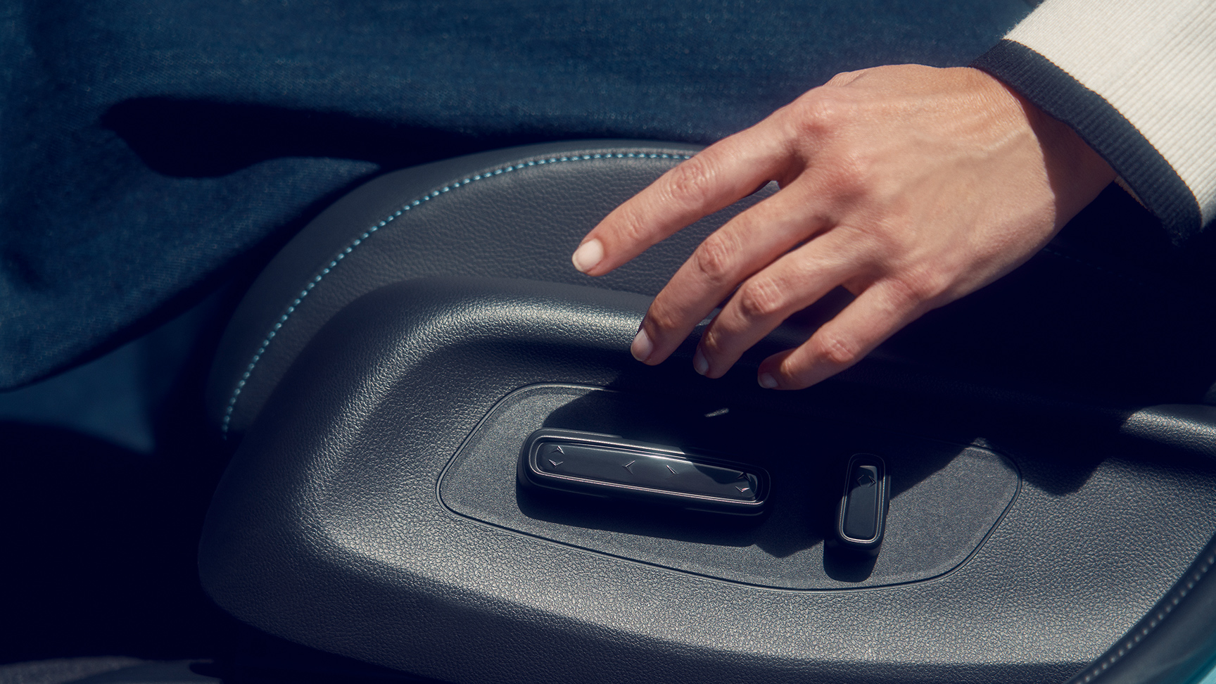 Close-up van de Honda e:Ny1 zetelverstelling.