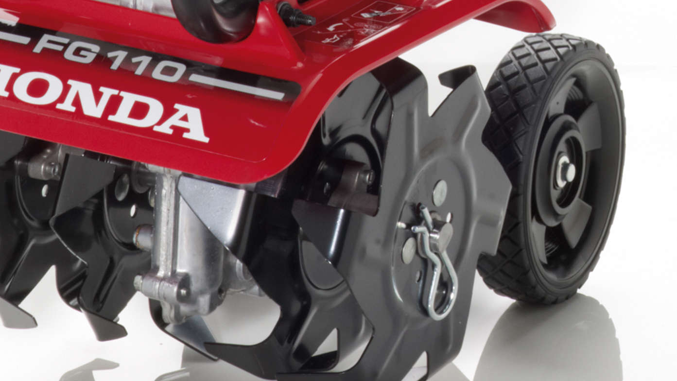 Honda-microtuinfrezen, close-up, focus op wielen.