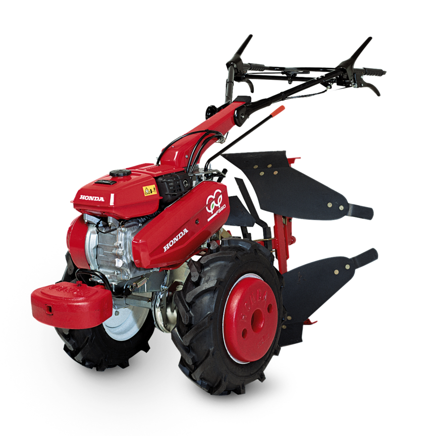 2x Honda tweewielige trekkers, driekwart vooraanzicht, zicht op linkerkant.