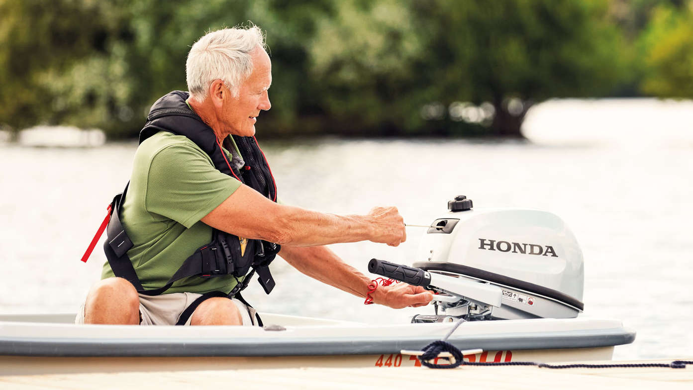 Model on a boat starting engine.