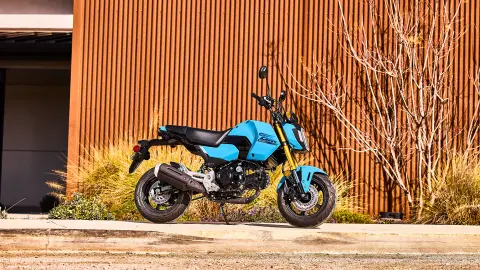 Statisch zijshot van de MSX125 Grom in blauw