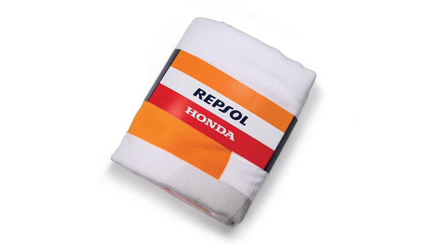 Honda Repsol strandlaken met Honda MotoGP-kleuren en Repsol-logo.